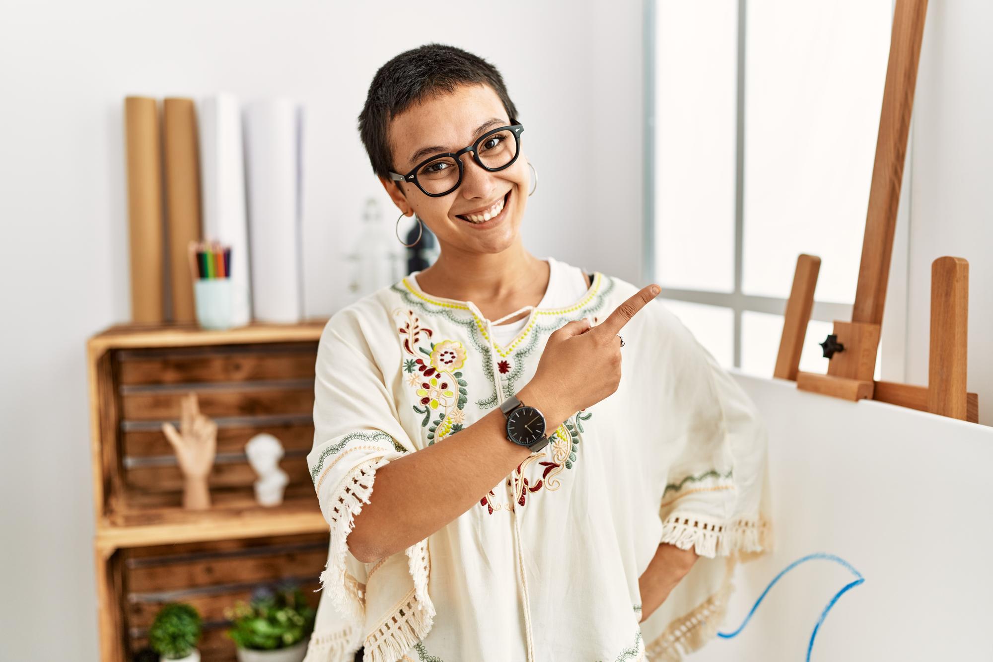 Instructor demonstrating embroidery technique in studio